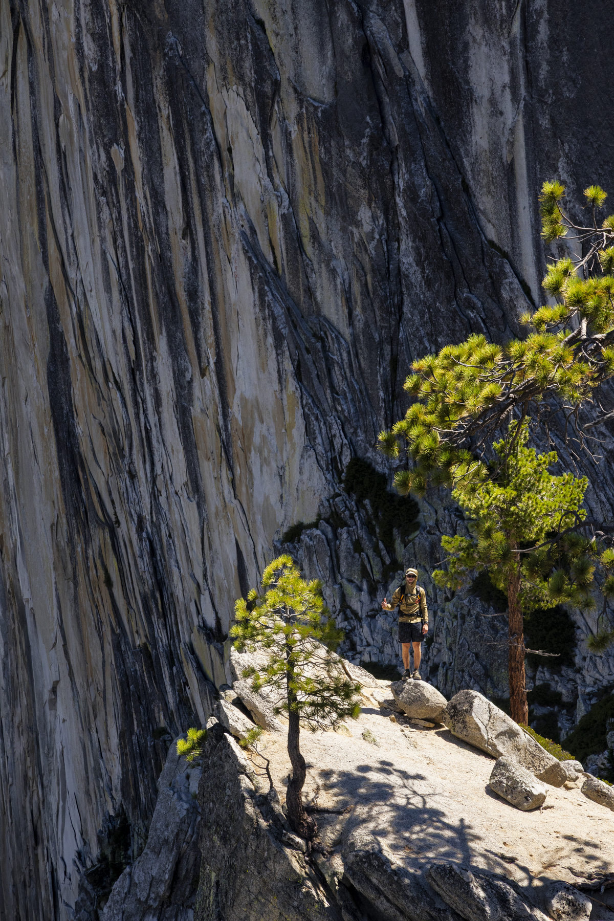 Thumbs up on a granite ledge below Half Dome, Yosemite